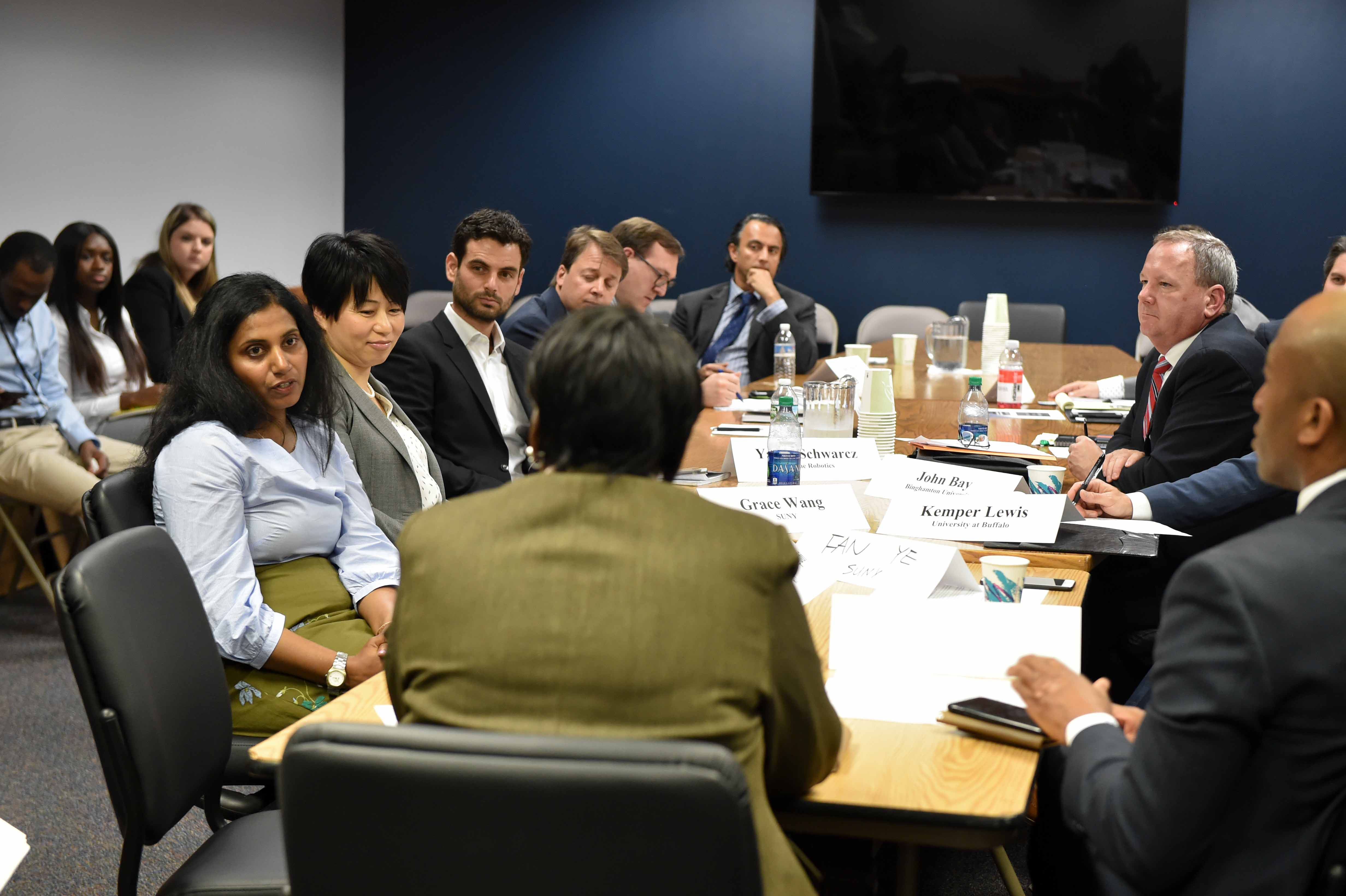 Assembly member Vanel with colleagues at Artificial Intelligence Round Table