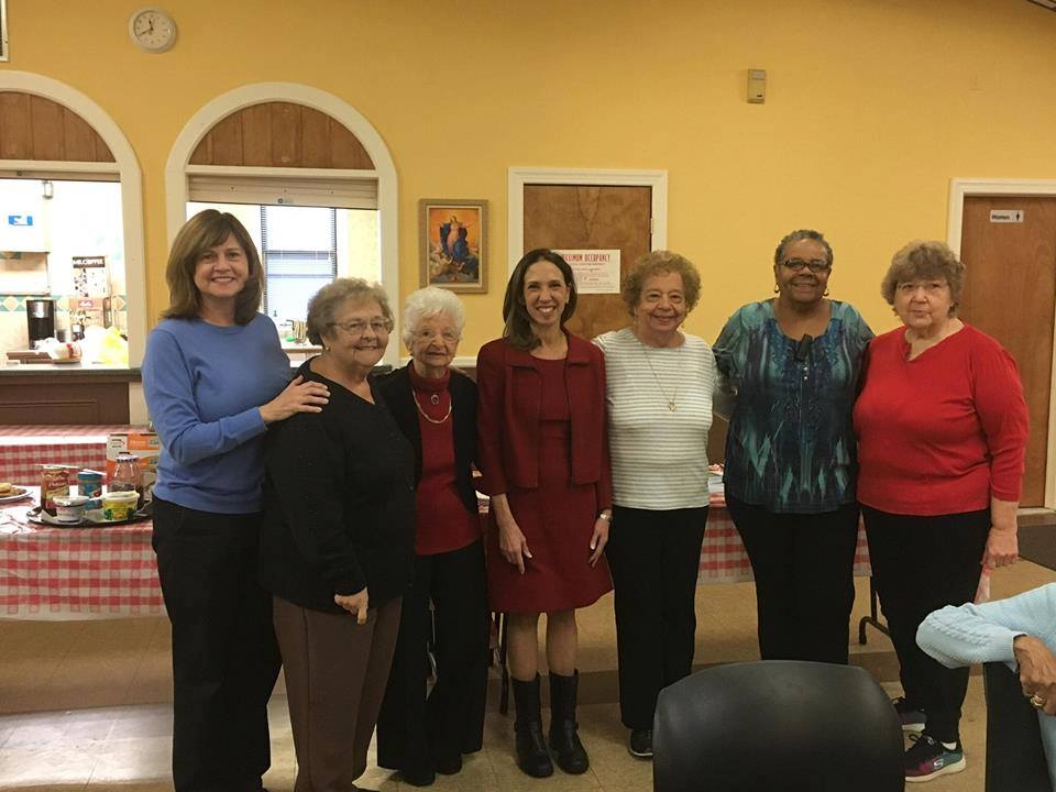 Assemblywoman Amy Paulin giving holiday cookies in Tuckahoe